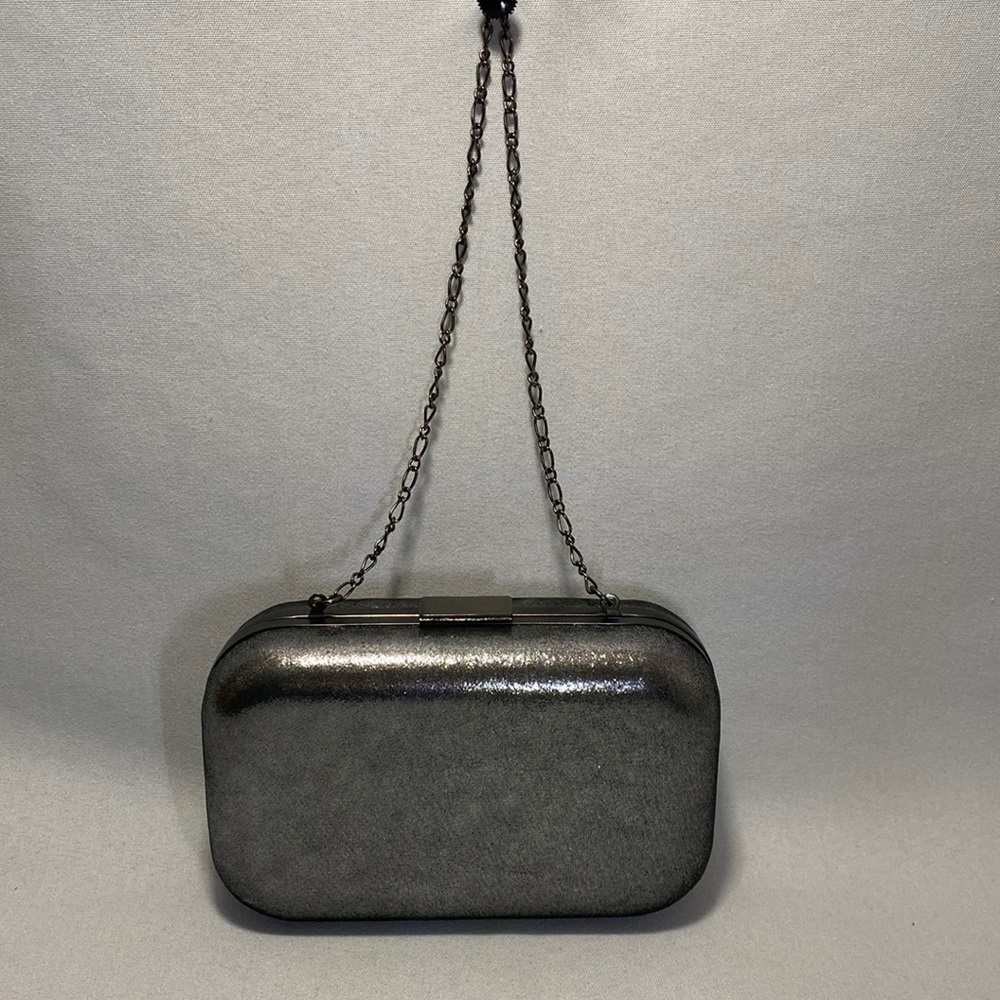 Banana Republic small grey/silver oval leather clutch with chain.